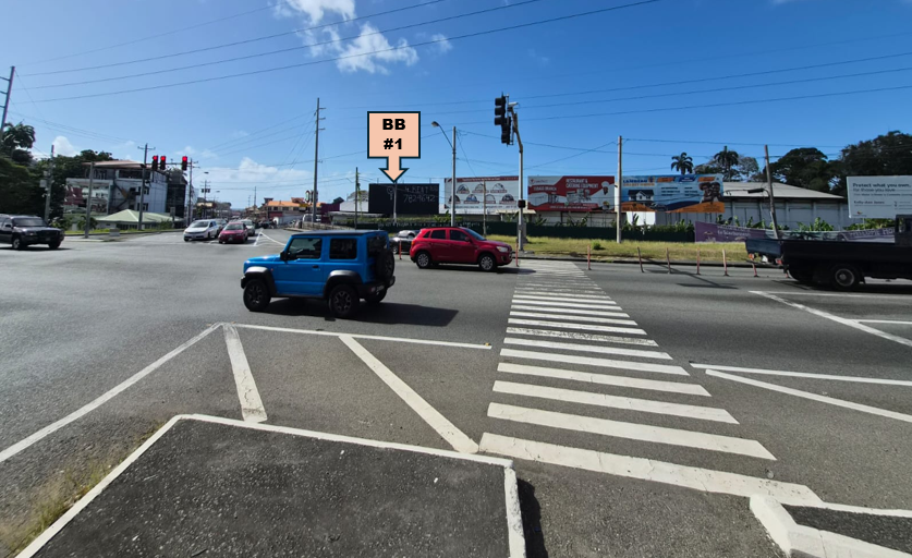 Intersection  of Wilson Road & Claude Noel Hwy for traffic heading West and South, BB#1 32ft W x12ft H
