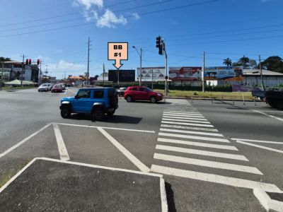 Intersection  of Wilson Road & Claude Noel Hwy for traffic heading West and South, BB#1 32ft W x12ft H