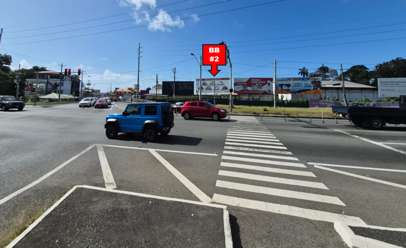 Intersection  of Wilson Road & Claude Noel Hwy for traffic heading West and South, BB#2 32ft W x12ft H
